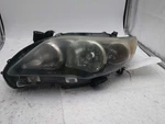 Driver Left Headlight With Black Trim Fits 11-13 Corolla 700803. Fixed Price $129.99.