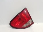 1999-04 Oldsmobile Alero Passenger Right Tail Light Lid Mount. Fixed Price $24.99.