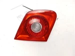 2005 - 2007 Volkswagen Jetta Rear Left Tail Lamp Lid. Fixed Price $78.00.
