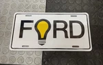 Ford Better Idea License Plate Tag Yellow Light Bulb. Fixed Price $200.00.