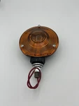 Dominion Auto 70-6064 Amber Stop Tail Light With Black Metal Housing 73-1791-A. Fixed Price $25.00.