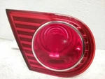 Driver Left Tail Light Lid Mounted Fits 04-06 Amanti 24699. Fixed Price $66.00.
