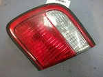 Passenger Right Tail Light Lid Mounted Fits 99-00 Mazda Millenia 9965. Fixed Price $31.00.