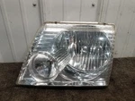 2002-05 Ford Explorer Drivers Left Headlight *grade B*. Fixed Price $59.99.