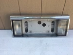 1985-1992 Cadillac Deville License Plate Housing. Fixed Price $104.72.
