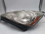 Driver Left Headlight Sport Fits 09-11 650664. Fixed Price $169.51.