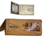 New Old Stock License Lamp With Bracket For 1961 Chrysler Wagon Models #1960118. Fixed Price $150.00.