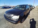 Passenger Headlight Without Xenon Chrome Backing Fits 99-03 Lexus RX300 12488452. Fixed Price $104.02.