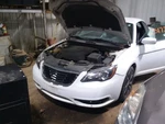Passenger Headlight Black Bezel With Chrome Insert Fits 11-12 200 2131536. Fixed Price $85.50.