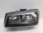 2003-04 Chevrolet Silverado 3500 Drivers Left Headlight W/o Cladding. Fixed Price $64.99.