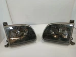 Aftermarket Headlight Pair From 2001 Toyota Tundra 11350840. Fixed Price $95.94.