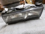 Driver Left Headlight Composite Se Fits 86-88 Grand Am 193429. Fixed Price $54.00.