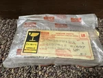 New Genuine Isuzu 8-94257512-1 Truck Reverse Back Up Light Lens. Fixed Price $20.00.