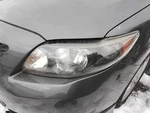 Driver Left Headlight With Black Trim Fits 09-10 Corolla 3147178. Fixed Price $200.90.