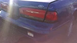 Tail Light Center Driver Left With Lx Emblem Fits 94-95 Thunderbird 542945. Fixed Price $129.89.