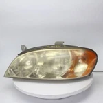 2003 Kia Spectra Lh Head Lamp Part Number 114-58911L. Fixed Price $63.99.