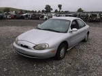 Used Left Tail Light Assembly Fits: 1997 Mercury Sable Sdn Lid Mounted Grad. Fixed Price $72.00.