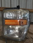 Driver Headlight Composite Fits 08-10 Ford F250SD Pickup 65908. Fixed Price $179.99.