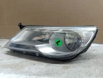 Driver Left Headlight Halogen Fits 09-11 Tiguan 212708. Fixed Price $117.00.