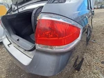 2008-11 Passenger Tail Light Sedan Bright Chrome Trim Focus 4048902. Fixed Price $106.00.