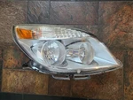 Passenger Right Rh Headlight Thru 4/11/07 Fits Aura Oem. Fixed Price $65.00.